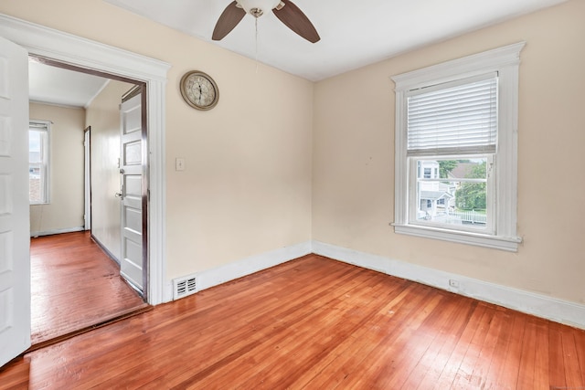 174 Franklin Ave, Stratford, CT 06614 - unfurnished room featuring light wood finished floors, ceiling fan, and baseboards