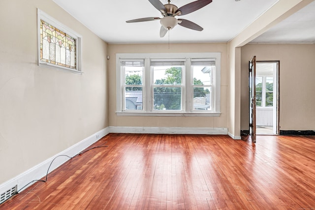 174 Franklin Ave, Stratford, CT 06614 - empty room featuring hardwood / wood-style floors, a ceiling fan, and baseboards
