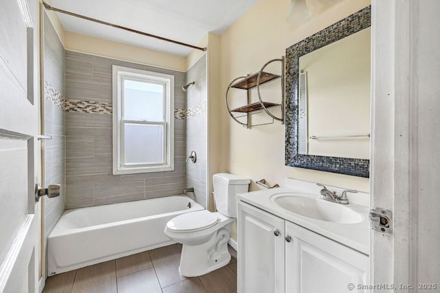 174 Franklin Ave, Stratford, CT 06614 - bathroom with toilet, vanity, and shower / bath combination
