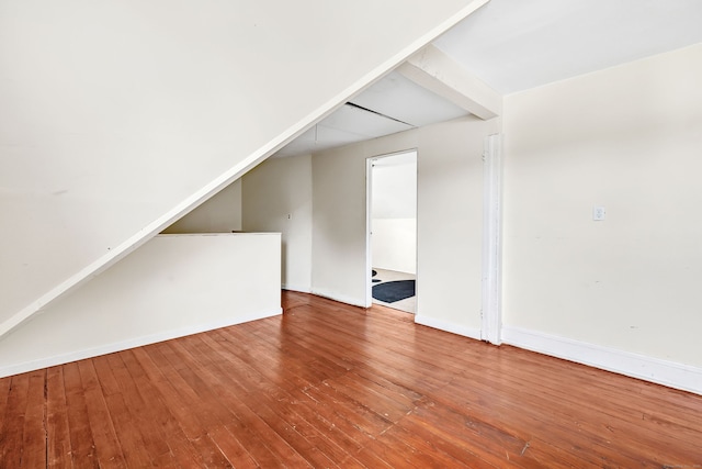 174 Franklin Ave, Stratford, CT 06614 - unfurnished living room featuring hardwood / wood-style flooring and baseboards