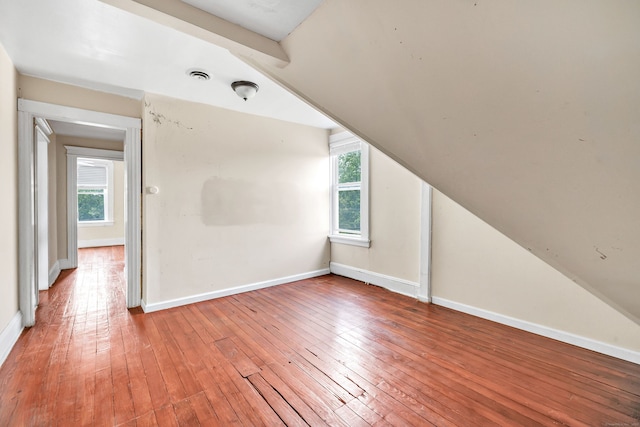 174 Franklin Ave, Stratford, CT 06614 - bonus room featuring wood-type flooring, plenty of natural light, and lofted ceiling