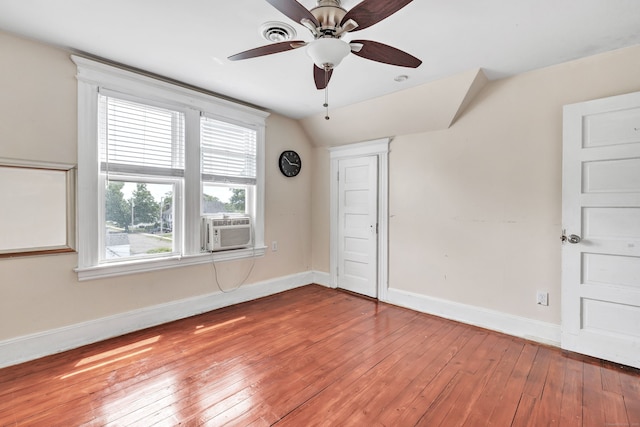 174 Franklin Ave, Stratford, CT 06614 - spare room featuring ceiling fan, baseboards, hardwood / wood-style flooring, cooling unit, and lofted ceiling