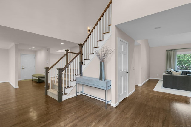 14 The Mews, Westport, CT 06880 - staircase featuring baseboards, wood finished floors, and recessed lighting