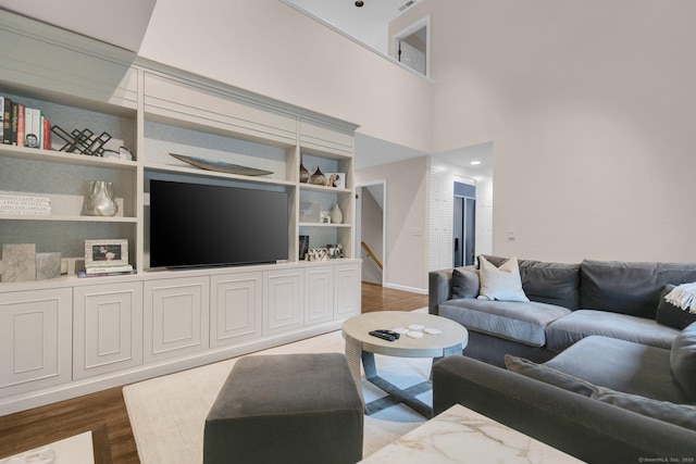 14 The Mews, Westport, CT 06880 - living room featuring wood finished floors and built in shelves