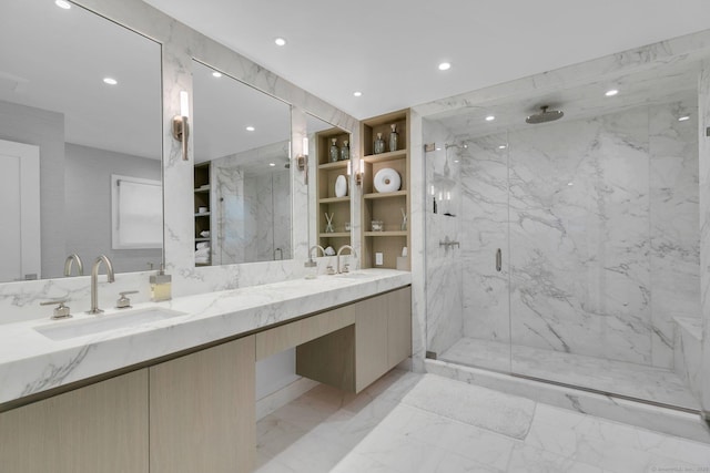 14 The Mews, Westport, CT 06880 - full bath with a marble finish shower, double vanity, recessed lighting, and marble finish flooring