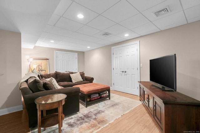 14 The Mews, Westport, CT 06880 - living room with light wood-type flooring, baseboards, a drop ceiling, and recessed lighting