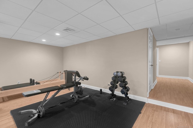 14 The Mews, Westport, CT 06880 - exercise area featuring a paneled ceiling, wood finished floors, baseboards, and recessed lighting