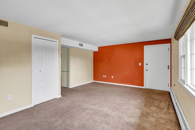 4 Loveland Hill Rd Unit F2, Vernon, CT 06066 - empty room with baseboard heating, carpet floors, and healthy amount of natural light