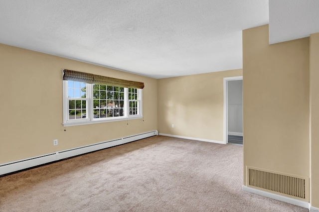 4 Loveland Hill Rd Unit F2, Vernon, CT 06066 - carpeted empty room with a baseboard radiator, a textured ceiling, and baseboards