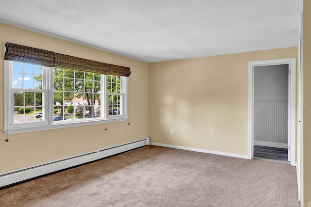 4 Loveland Hill Rd Unit F2, Vernon, CT 06066 - empty room featuring a baseboard heating unit, carpet flooring, baseboards, and a textured ceiling