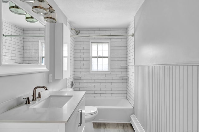 4 Loveland Hill Rd Unit F2, Vernon, CT 06066 - full bath featuring vanity, toilet, wood finished floors, shower / bathtub combination, and a textured ceiling