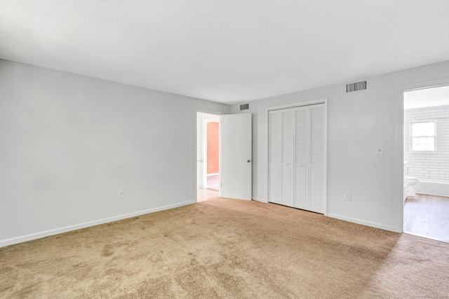 4 Loveland Hill Rd Unit F2, Vernon, CT 06066 - unfurnished bedroom with carpet floors, baseboards, and a closet