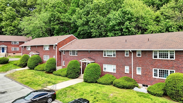 4 Loveland Hill Rd Unit F2, Vernon, CT 06066 - view of property featuring uncovered parking