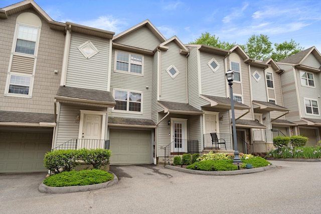19 Hawthorne Dr Unit 124, New London, CT 06320 - townhome / multi-family property with asphalt driveway and an attached garage