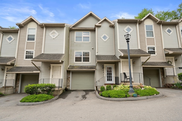 19 Hawthorne Dr Unit 124, New London, CT 06320 - multi unit property with an attached garage, driveway, and stone siding
