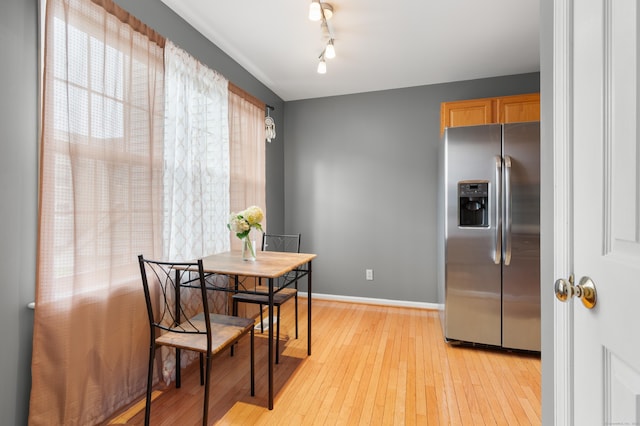 19 Hawthorne Dr Unit 124, New London, CT 06320 - dining room featuring light wood-style floors and baseboards