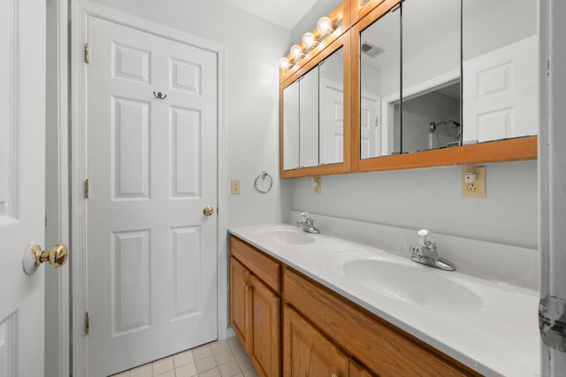 19 Hawthorne Dr Unit 124, New London, CT 06320 - bathroom with double vanity and tile patterned flooring