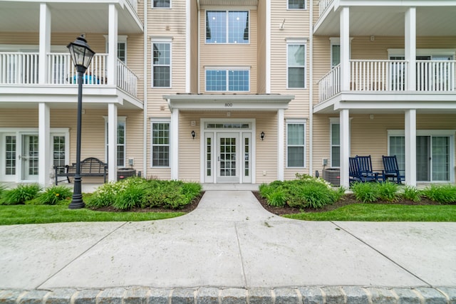 802 Center Meadow Ln Unit 802, Danbury, CT 06810 - view of exterior entry featuring a balcony and central air condition unit
