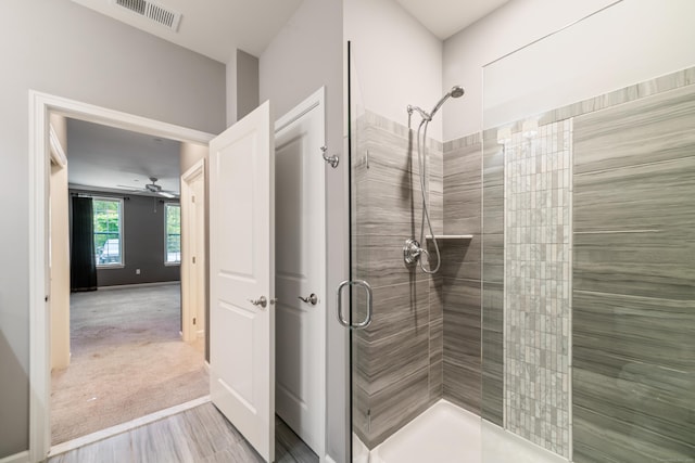 802 Center Meadow Ln Unit 802, Danbury, CT 06810 - bathroom with a shower stall, a ceiling fan, and wood finished floors