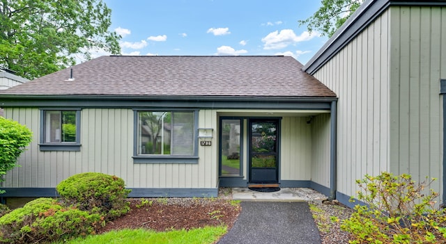 170 Heritage Vlg Unit B, Southbury, CT 06488 - view of exterior entry with roof with shingles