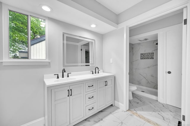 170 Heritage Vlg Unit B, Southbury, CT 06488 - full bath featuring marble finish flooring, baseboards, double vanity, a marble finish shower, and toilet