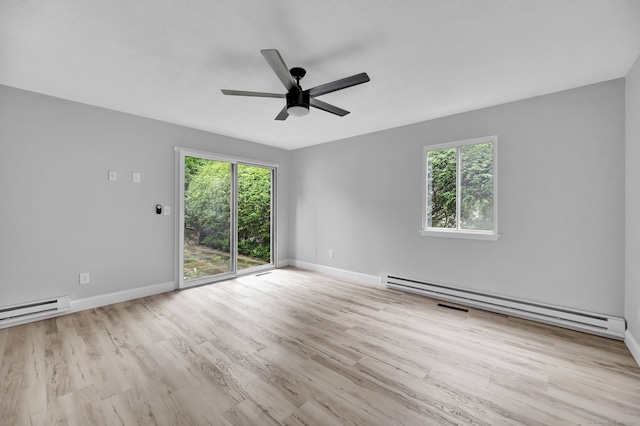 170 Heritage Vlg Unit B, Southbury, CT 06488 - unfurnished room with plenty of natural light, wood finished floors, a baseboard heating unit, and baseboards