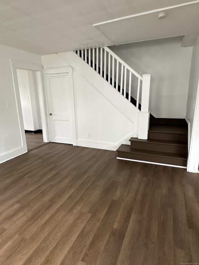 47 Holl St, Manchester, CT 06040 - staircase with wood finished floors and baseboards
