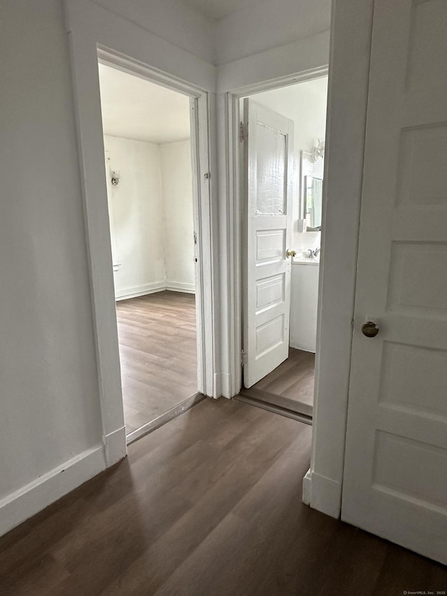 47 Holl St, Manchester, CT 06040 - corridor with wood finished floors and baseboards
