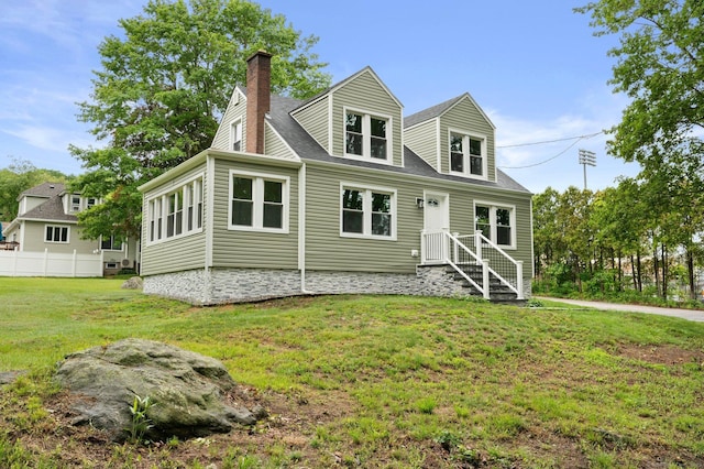 56 Uncas Ave, New London, CT 06320 - back of property featuring a chimney and roof with shingles
