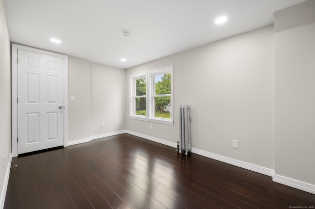 56 Uncas Ave, New London, CT 06320 - spare room featuring radiator, baseboards, wood finished floors, recessed lighting, and a smoke detector