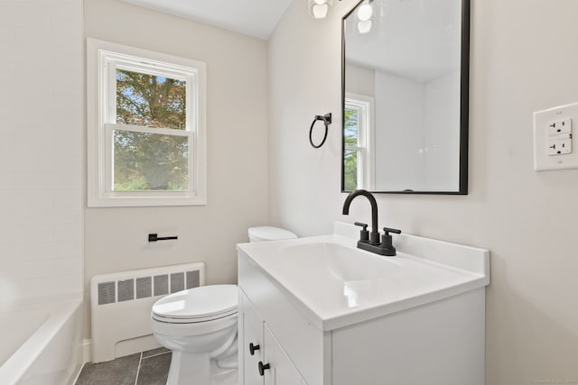 1357 Slater Rd, New Britain, CT 06053 - full bath with radiator heating unit, vanity, toilet, and tile patterned flooring