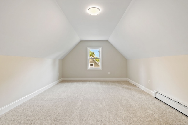 1357 Slater Rd, New Britain, CT 06053 - additional living space featuring a baseboard heating unit, light carpet, baseboards, and lofted ceiling