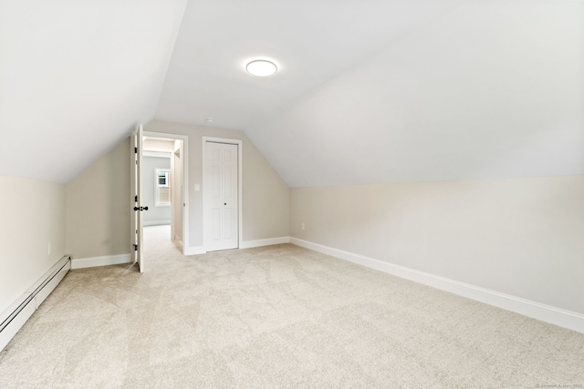 1357 Slater Rd, New Britain, CT 06053 - bonus room with baseboard heating, light colored carpet, lofted ceiling, and baseboards
