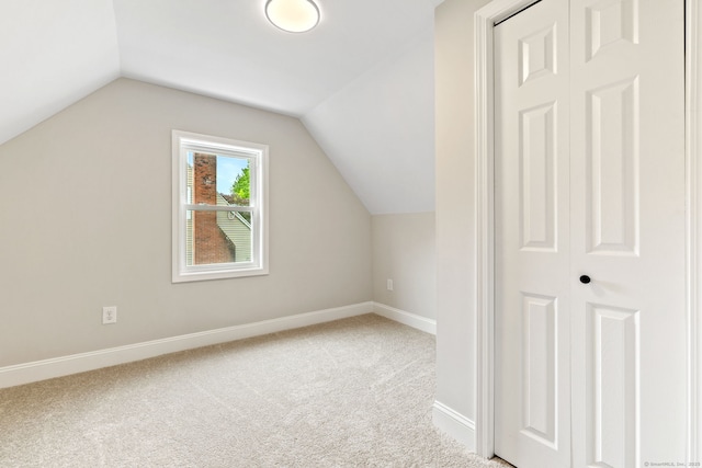1357 Slater Rd, New Britain, CT 06053 - additional living space with carpet flooring, baseboards, and lofted ceiling