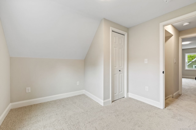 1357 Slater Rd, New Britain, CT 06053 - additional living space featuring carpet, baseboards, and vaulted ceiling
