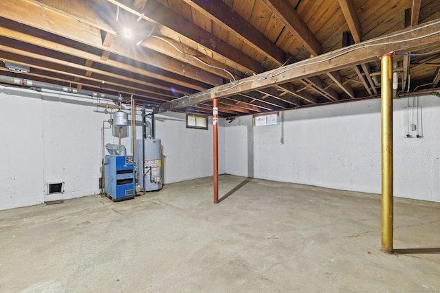 1357 Slater Rd, New Britain, CT 06053 - basement with water heater and a heating unit