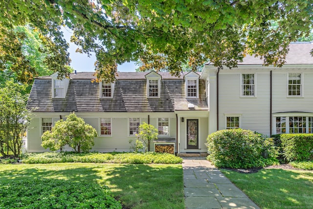 264 Taugwonk Rd, Stonington, CT 06378 - view of front facade with a front lawn
