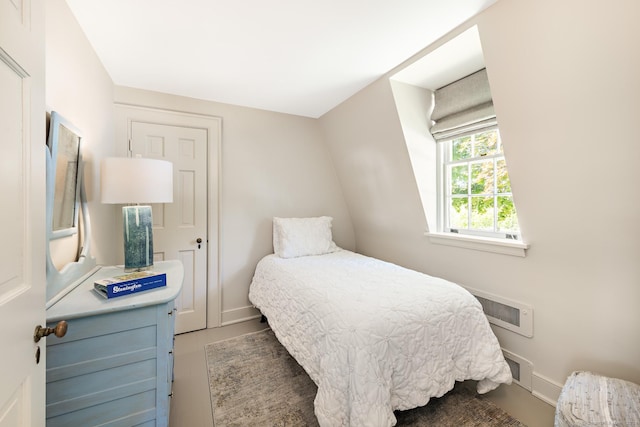 264 Taugwonk Rd, Stonington, CT 06378 - bedroom featuring baseboards and a wall unit AC
