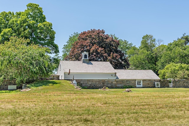 264 Taugwonk Rd, Stonington, CT 06378 - view of home's exterior with stone siding and a yard