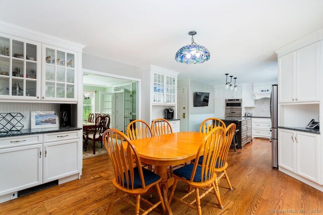 12 Fawn Ridge Dr, Brookfield, CT 06804 - dining room featuring light wood-style flooring and a chandelier