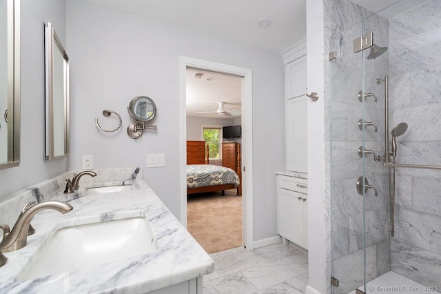 12 Fawn Ridge Dr, Brookfield, CT 06804 - ensuite bathroom featuring a marble finish shower, double vanity, marble look tile flooring, baseboards, and ceiling fan