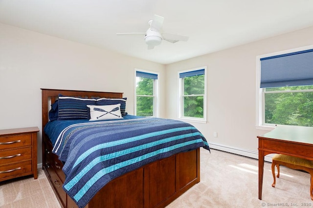 12 Fawn Ridge Dr, Brookfield, CT 06804 - bedroom with light carpet, ceiling fan, baseboards, and a baseboard heating unit