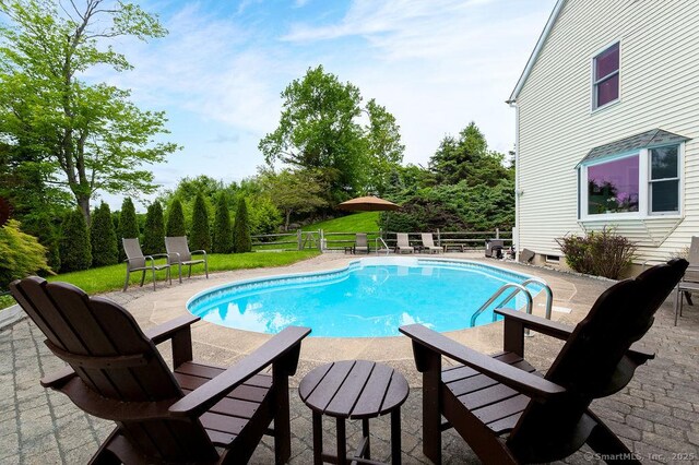 12 Fawn Ridge Dr, Brookfield, CT 06804 - swimming pool featuring a patio