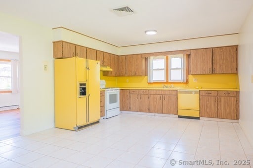 188 Judith Ln, Waterbury, CT 06704 - kitchen featuring white appliances, light countertops, extractor fan, and a sink