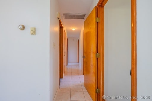 188 Judith Ln, Waterbury, CT 06704 - hallway featuring light tile patterned floors