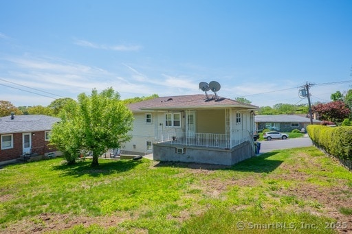 188 Judith Ln, Waterbury, CT 06704 - back of property featuring a yard