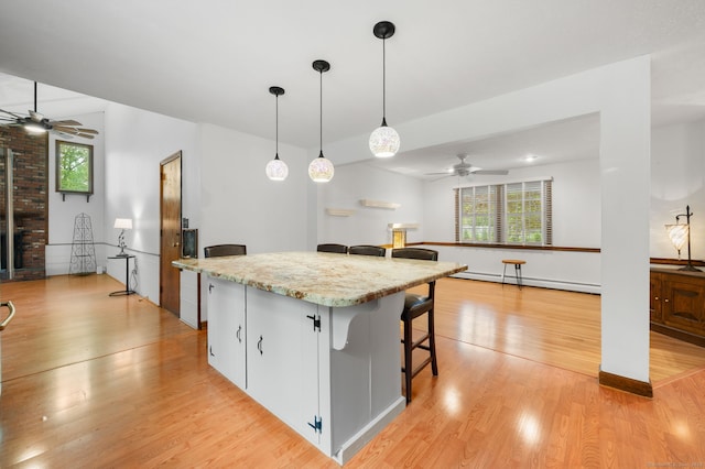 80 Farmstead Ln, Windsor, CT 06095 - kitchen with a ceiling fan, light wood finished floors, and baseboard heating