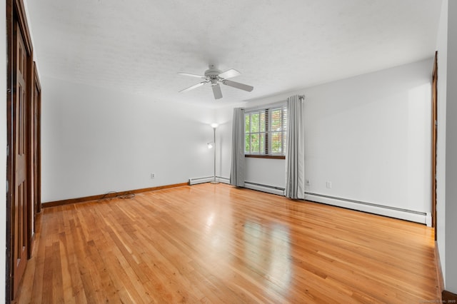 80 Farmstead Ln, Windsor, CT 06095 - spare room with a ceiling fan, light wood finished floors, a baseboard radiator, and baseboards