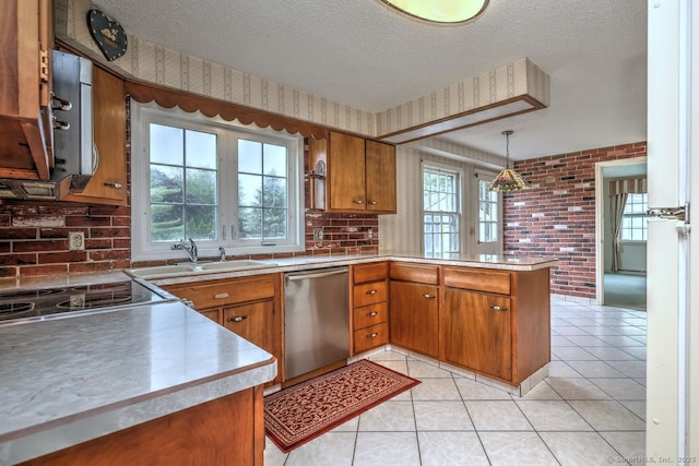 423 Baldwin Ave, Meriden, CT 06450 - kitchen featuring dishwasher, a sink, brown cabinets, a peninsula, and a textured ceiling
