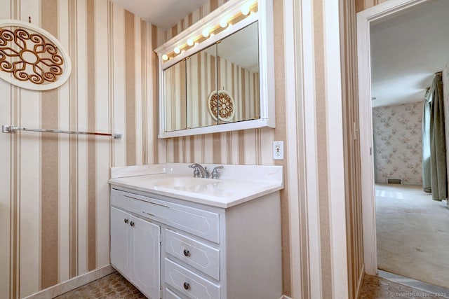 423 Baldwin Ave, Meriden, CT 06450 - bathroom with wallpapered walls and vanity